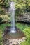 Waterfall flowing into plunge pool in a national Park in Australia