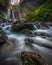 The waterfall in the forest is very beautiful if the water is made gently into a calm and cool sight to see it