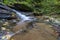 Waterfall in the Foreste Casentinesi NP in autumn, Tuscany, Ital