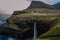 Waterfall and Gasadalur village, Faroe Islands.