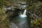 Waterfall on a green creek