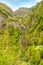 Waterfall and greenish forest landscape, Madeira