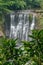 Waterfall hitting and splash on the surface of hard rocks, near Taipei, Taiwan