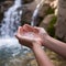 waterfall holding clear water in her hands