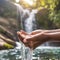 waterfall holding clear water in her hands