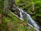 Waterfall HÃ¶llbachgspreng, wooded rock massif