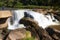 Waterfall Kaeng Sopha with streams and sunshine