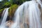 Waterfall landscape view of fresh water flows on rock