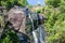 Waterfall on Langkawi island in rocky mountain in jungle on tropical