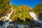 Waterfall Latefossen at sunset lights in summer, Norway