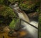 Waterfall on Lesni creek in Sumava national park in spring day