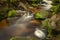 Waterfall on Lesni creek in Sumava national park in spring day