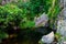 Waterfall in Manteigas Town, Serra da Estrela or Mountain of Star in Portugal called Poco do Inferno or Hell Pit