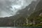 Waterfall at Milford Sound on a stormy day