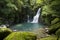 Waterfall and mossy rocks