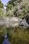 Waterfall, mountain spring water, stream between rocks and stones, brook, creek. Khlong Phlu, Thailand