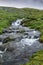 Waterfall in the mountains along the National tourist route Aurl