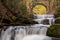 Waterfall in the mountains in a remote location with long exposure.