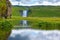 The waterfall, pond and flower beds