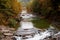 Waterfall Probiy in Yaremche and mountain view river Prut. Autumn landscape. Carpathians, Ukraine. Selective soft focus