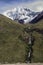 Waterfall and Quitaraju mountain peak located in the Cordillera