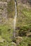 Waterfall and rainbow in Flores island, Azores. Poco do Bacalhau