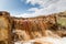 Waterfall in Riotinto mining area, Andalusia, Spain