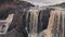 Waterfall in river in Laikipia, Kenya. Aerial drone view left to right