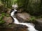 Waterfall of River LeÃ§a in the woods of Monte Cordova