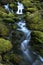 Waterfall, river with moss on rocks, long exposure