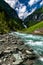 Waterfall And River Of Umbalfaelle At Mountain Grossvenediger In Nationalpark Hohe Tauern In Tirol In Austria