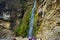 Waterfall beside the road in Himalayan mountain, near Thimphu, Bhutan