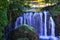 The waterfall with rock ahead of it. Rastoke, Croatia,