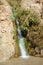 Waterfall in rocks of Ein Gedi Dead Sea