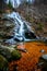 Waterfall and rocks and ice