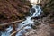 Waterfall Shypit on river Pylypets, Carpathian Mountains in Transcarpathia, mystic evening down Gemba mountain