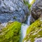 Waterfall of Soca River near the Source of SoÄa. First Kilometer after main Pond Cave in Julian Alps. Bovec, Gorizia, Slovenia,