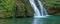 Waterfall from the source of the Lison in a haven of peace with its waterfall surrounded by forest