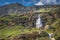 Waterfall at springtime in alpine landscape, Gran Paradiso Alps, Italy