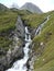 Waterfall at Stubai high-altitude hiking trail in Tyrol, Austria