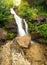 Waterfall in summer canyon