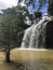 Waterfall in the sunlight in the city of Dalat