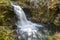 Waterfall surrounded by rocks