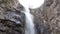 Waterfall surrounded by rocks. Bottom view. Gveletskie waterfalls. Georgia, Caucasus.