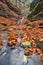 Waterfall in Tajovska dolina gorge near Tajov village during autumn