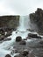 Waterfall at Thingvellir Iceland Rock Wall Cloudy
