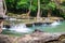 Waterfall with timber log scenic natural