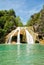 Waterfall at Turner Falls, Oklahoma, with beautiful aqua colored water