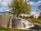 Waterfall in urban parkland. Minsk. Belarus.