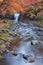 Waterfall with vibrant trees in autumn, Tometaki waterfall - Kazuno, Akita, Japan